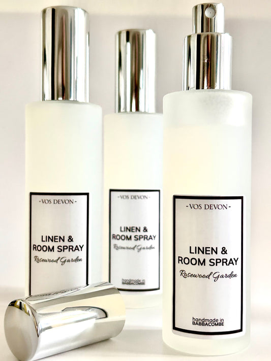 Three bottles of Vos Devon Linen & Room Spray on a white background